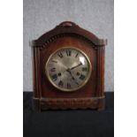 A German HAC mantle clock. In working order but missing its key. H.28 W.25 D.12cm.