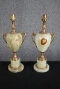 A matching pair of alabaster marble classical urn design table lamps with gilt brass detailing and