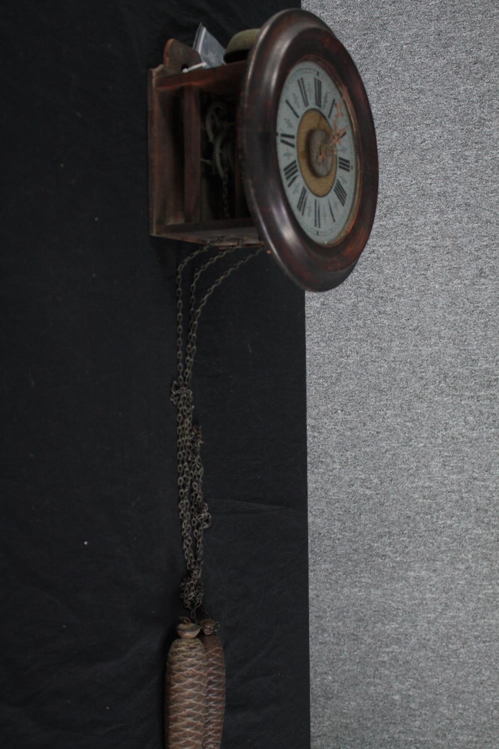 A 19th century Black Forest postman's alarm clock with black Roman numerals and fir cone weights. - Image 3 of 6