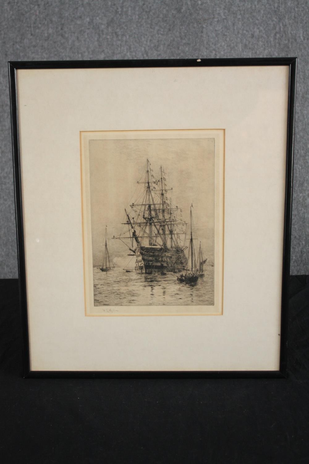 William Lionel Wyllie (British. 1851-1931). H.M.S Victory firing a salute. Drypoint etching. Hand - Image 2 of 3