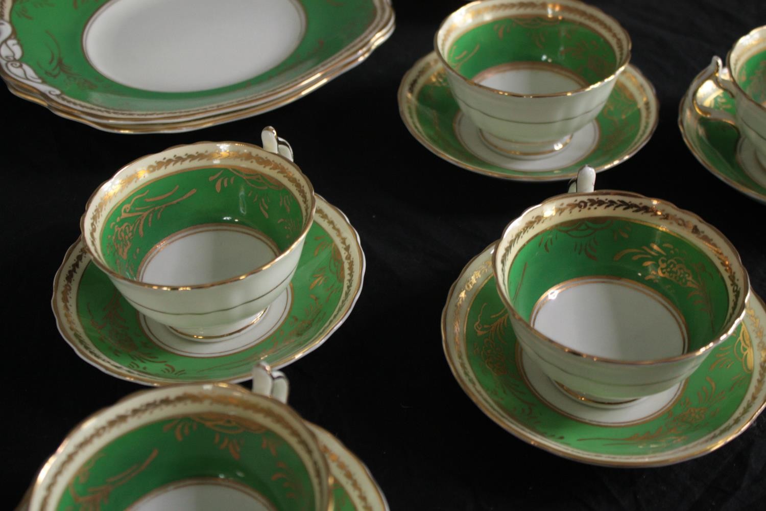 A German porcelain tea set for eleven people. 1930s Konig teacup & saucer, plates and creamer. In - Image 5 of 11