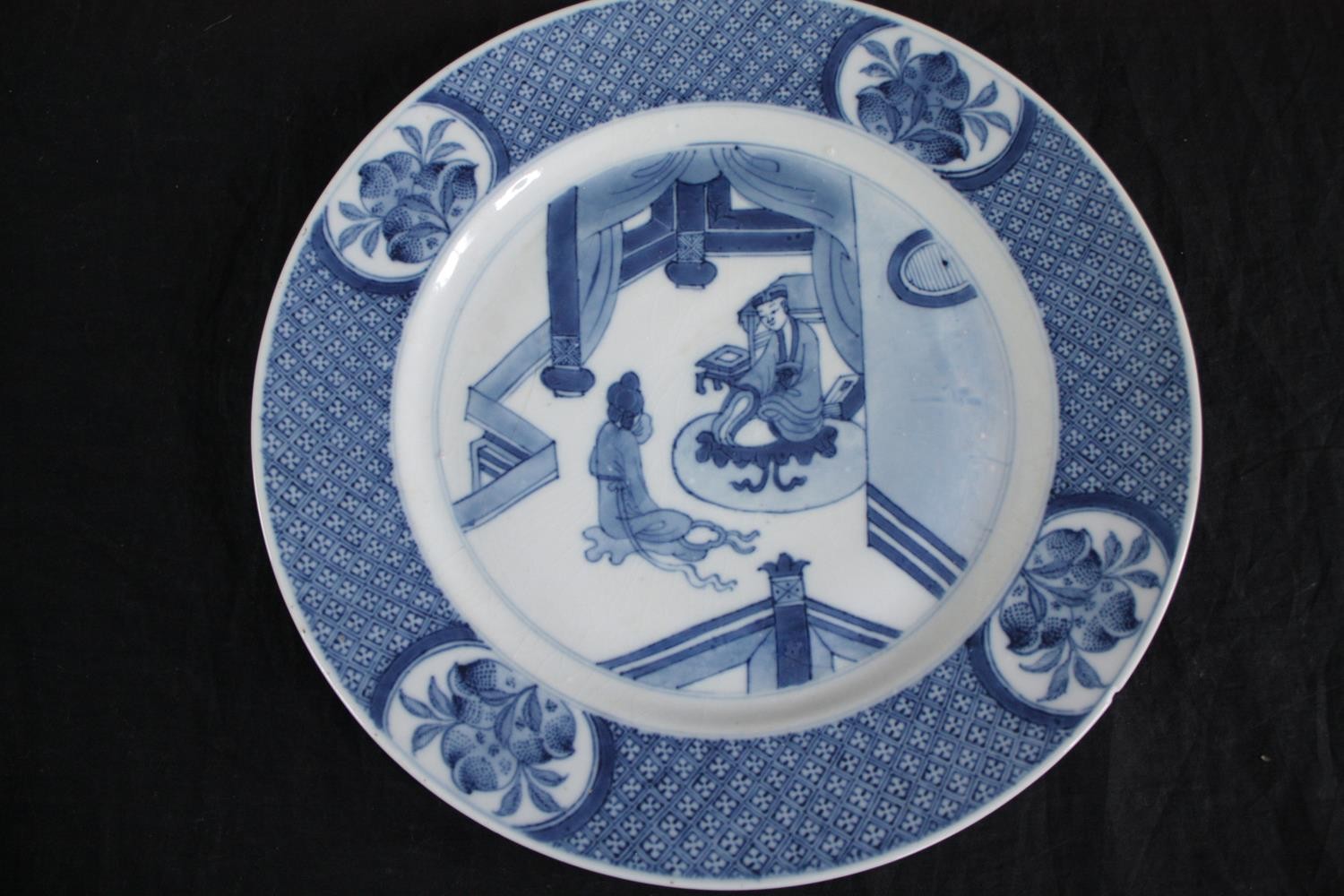 A pair of Qing dynasty Chinese blue and white china plates. Featuring a court scene withing a - Image 2 of 5