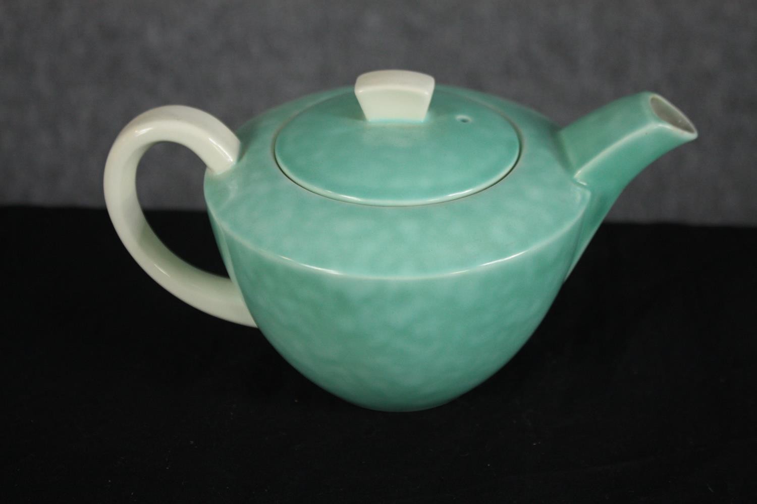 A Poole tea pot with two cups and saucers and a single plate. H.10 W.20cm. (largest) - Image 3 of 7