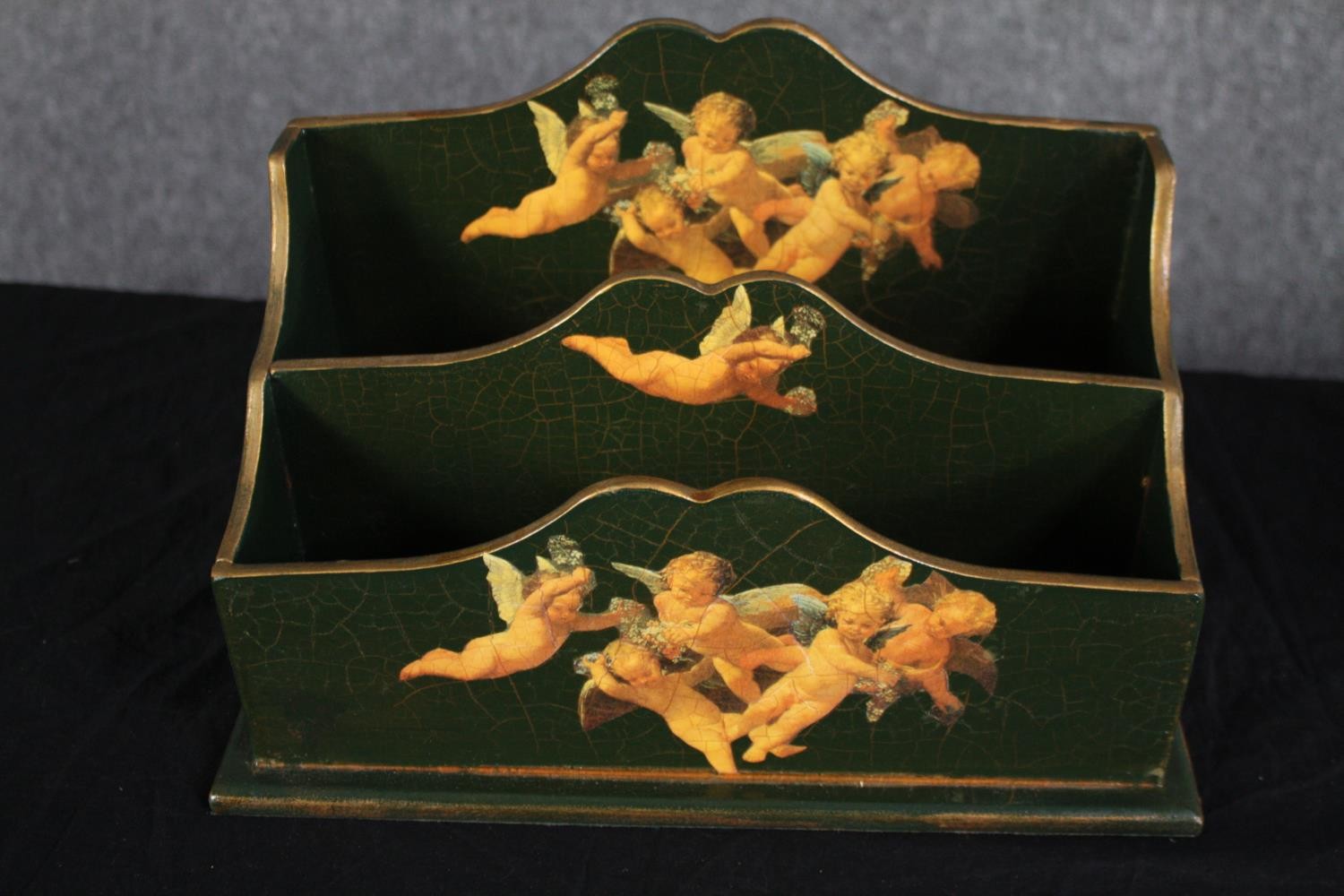 A lacquered letter rack decorated with cherubs and a gilt metal pierced foliate design magazine - Image 2 of 5