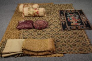 A collection of textiles and cushions, including a pair of silk floral design bolster cushions and a