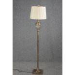 A standard floor lamp. A modern reproduction. H.152cm.