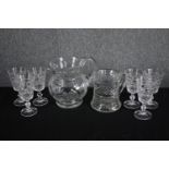 Six sherry glasses and and two jugs. H.16cm. (largest)