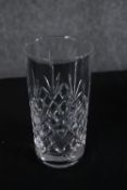 A crystal decanter with two sets of tumblers. H.28cm. (largest)