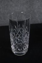 A crystal decanter with two sets of tumblers. H.28cm. (largest)