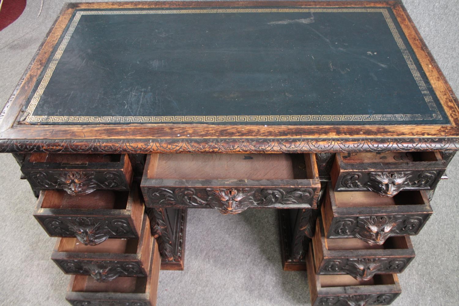 Pedestal desk, late 19th century carved oak with Green Man mask handles and tooled leather inset - Image 6 of 7