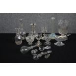 A assortment of 19th century glassware including decanters with their stoppers, glasses, rummers and