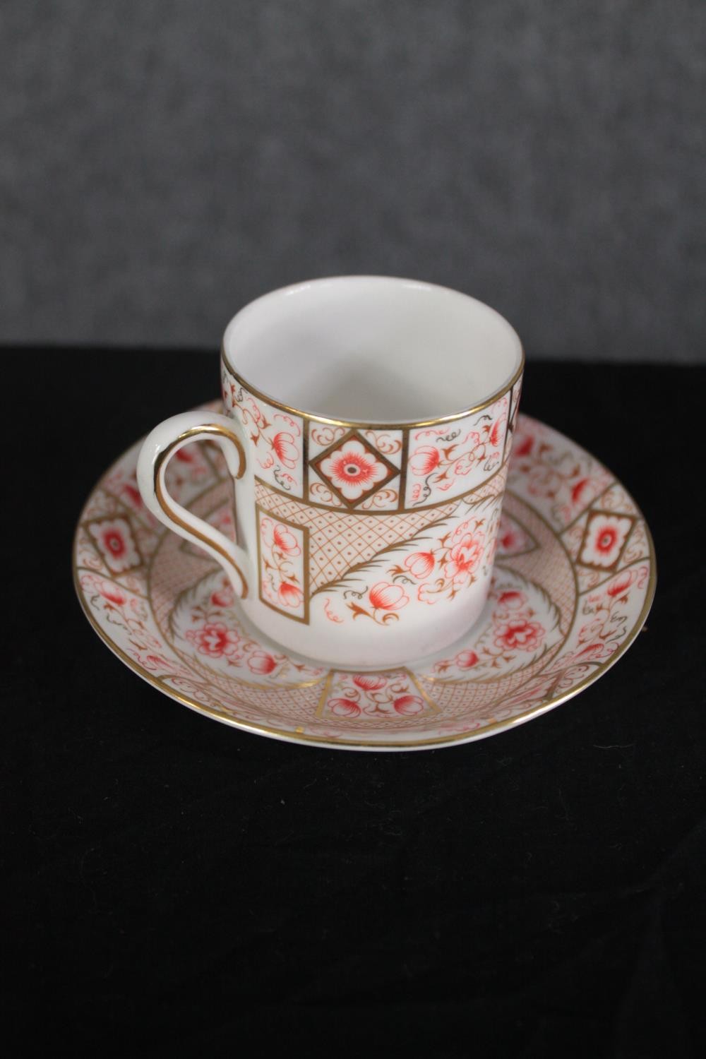 A set of six Royal Grafton china coffee cups and saucers. In a rose and gilt design. Maker's mark to - Image 2 of 5