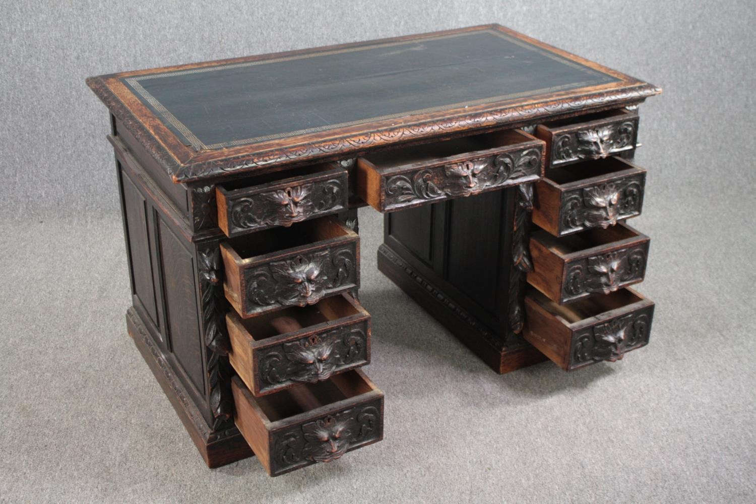 Pedestal desk, late 19th century carved oak with Green Man mask handles and tooled leather inset - Image 4 of 7