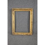 A 19th century giltwood and gesso picture frame. H.78 W.60cm.