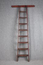 A vintage library ladder. H.210cm.