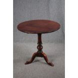 A Georgian tilt top table, in need of restoration. H.73 Dia.76cm.