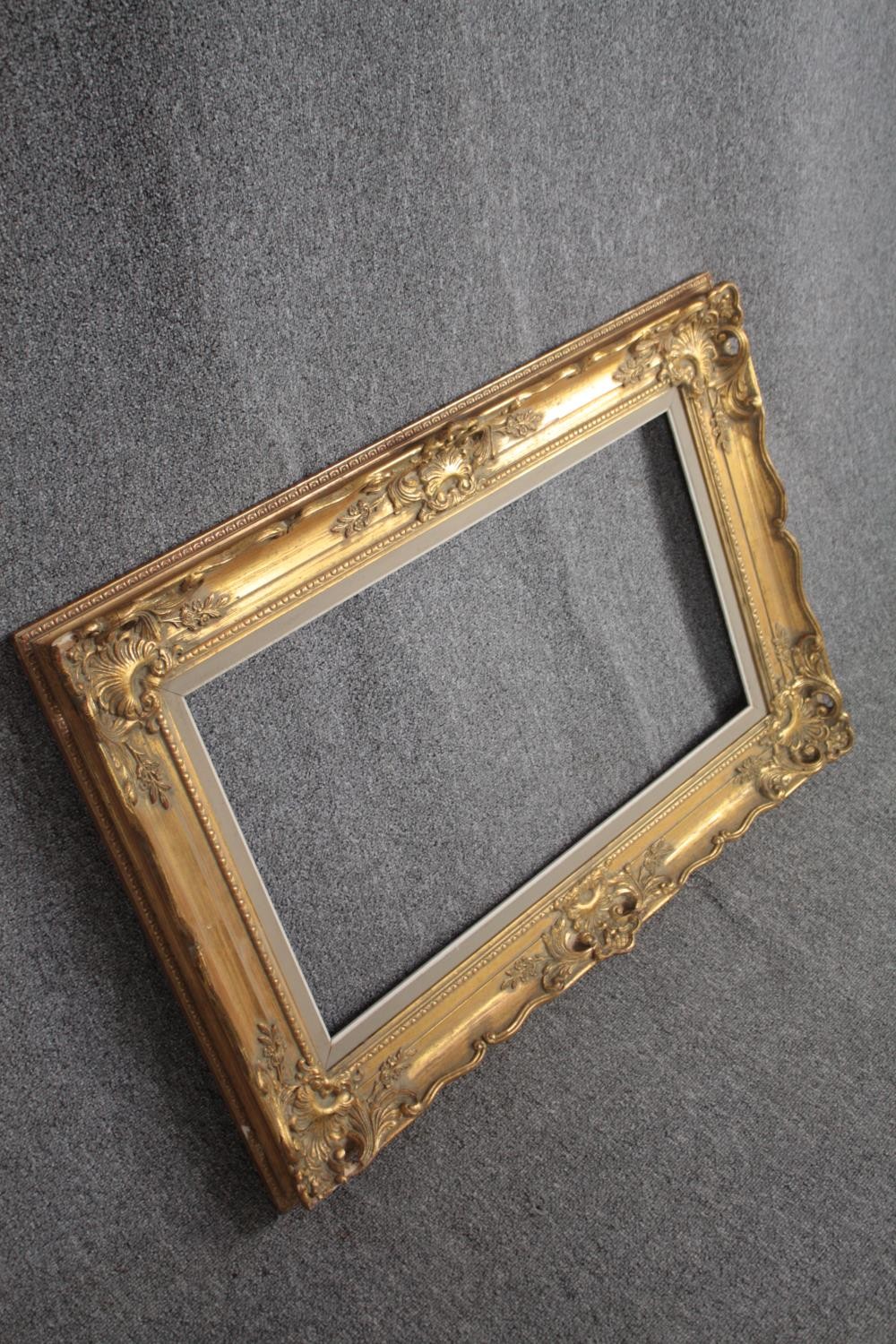 A giltwood and gesso picture frame. H.92 W.117cm. - Image 2 of 4