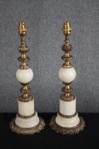 A matching pair of brass table lamps with a white alabaster bulb and base. H.46cm. (each)