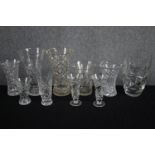 A collection of cut glass vases of various styles. H.26cm. (largest)