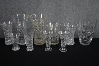 A collection of cut glass vases of various styles. H.26cm. (largest)
