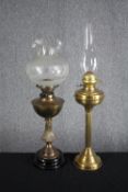 Two brass oil lamps. H.72cm. (largest)