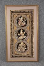 A Thai Buddha embroidery. A highly detailed work decorated with sequins. Framed and glazed. H.105