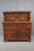 Court cupboard, mid century Jacobean style oak. H.125 W.120 D.46vm.