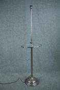 Floor standing lamp, chrome Art Deco style with a plate glass shelf at the centre. H.157 Dia.42 cm.
