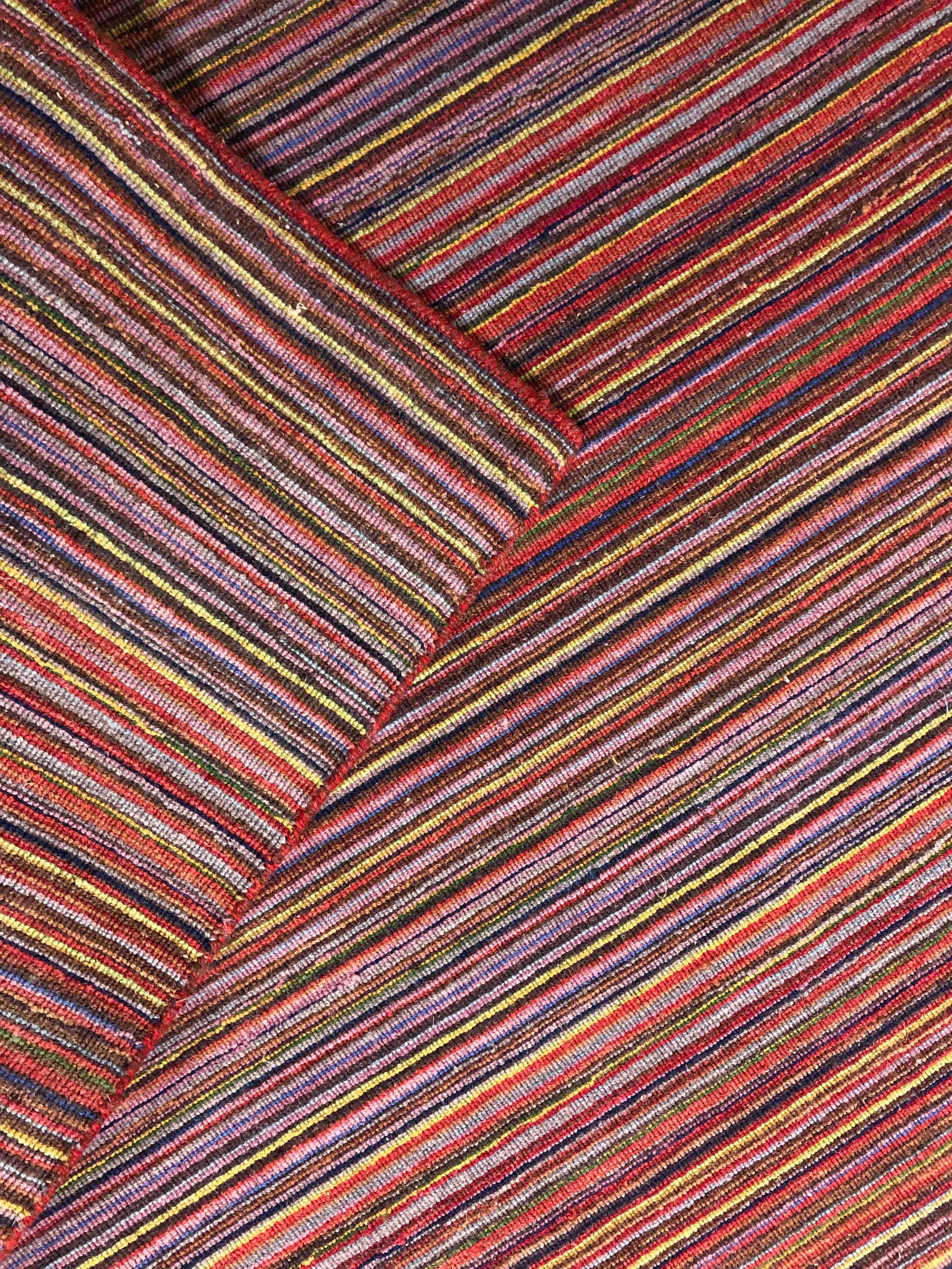 A contemporary flatweave multi-coloured carpet. L.276 W.180cm. - Image 2 of 3