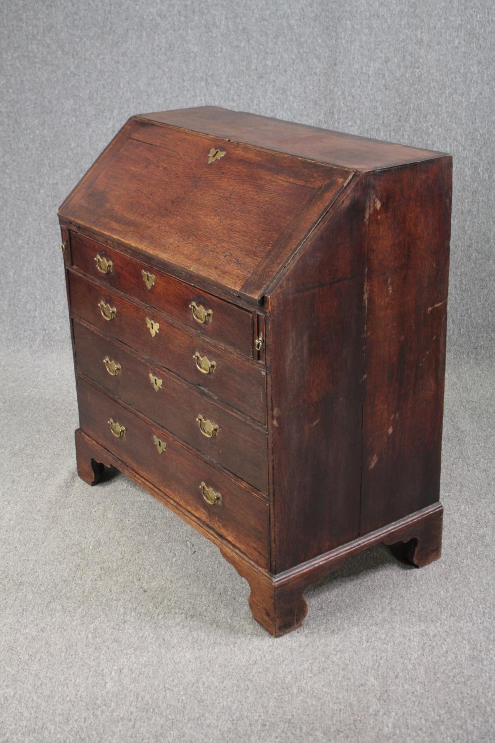 Bureau, Georgian oak with fitted interior. H.101 W.92 D.52cm. (Some wear and tear commensurate - Image 4 of 7