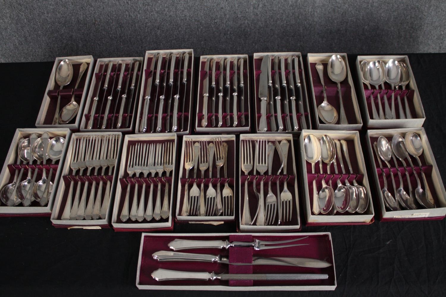 A large collection of Mappin and Webb silver plated cutlery. Housed in their original boxes.