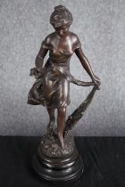 After Henryk Kossowski (Polish). Two patinated brass figures. Titled 'Automne' (autumn). Set on