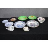 A collection of mixed porcelain plates and bowls, including a collection of cabbage ware plates.