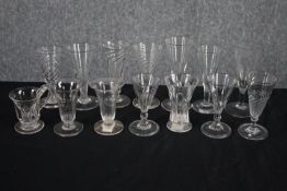 A collection of fourteen 19th and early 20th century cordial, posset and jelly glasses, some with