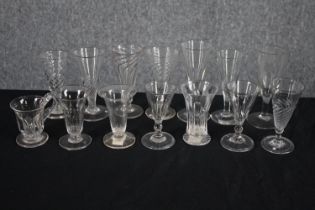 A collection of fourteen 19th and early 20th century cordial, posset and jelly glasses, some with