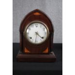 An Edwardian mahogany and satinwood mantel clock with a replacement modern movement. H.38 W.28 D.