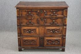 Chest of drawers, Jacobean oak with lozenge panelled drawers on stile feet. Possibly with all