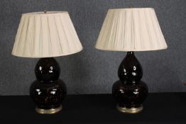A pair of large glazed gourd form ceramic Heathfield table lamps. Each mounted with twin light