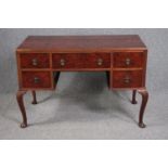 A mid century burr walnut Queen Anne style dressing table. H.78 W.113 D.53cm.