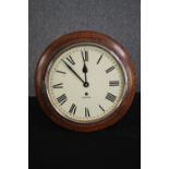 A Garrard wall clock. Probably 1940s, with pendulum and key Dia.34 cm.