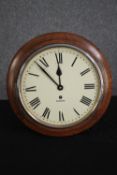 A Garrard wall clock. Probably 1940s, with pendulum and key Dia.34 cm.