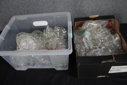 Two boxes of chandelier parts.