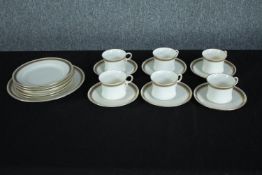 An early 20th century Samuel Radford gold and black Greek key design six person part tea set.