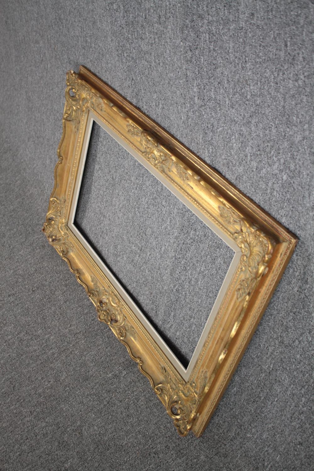 A giltwood and gesso picture frame. H.92 W.117cm. - Image 3 of 4