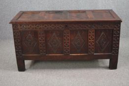Coffer, late 17th century or early 18th century lozenge carved oak panels on stile supports. H.69