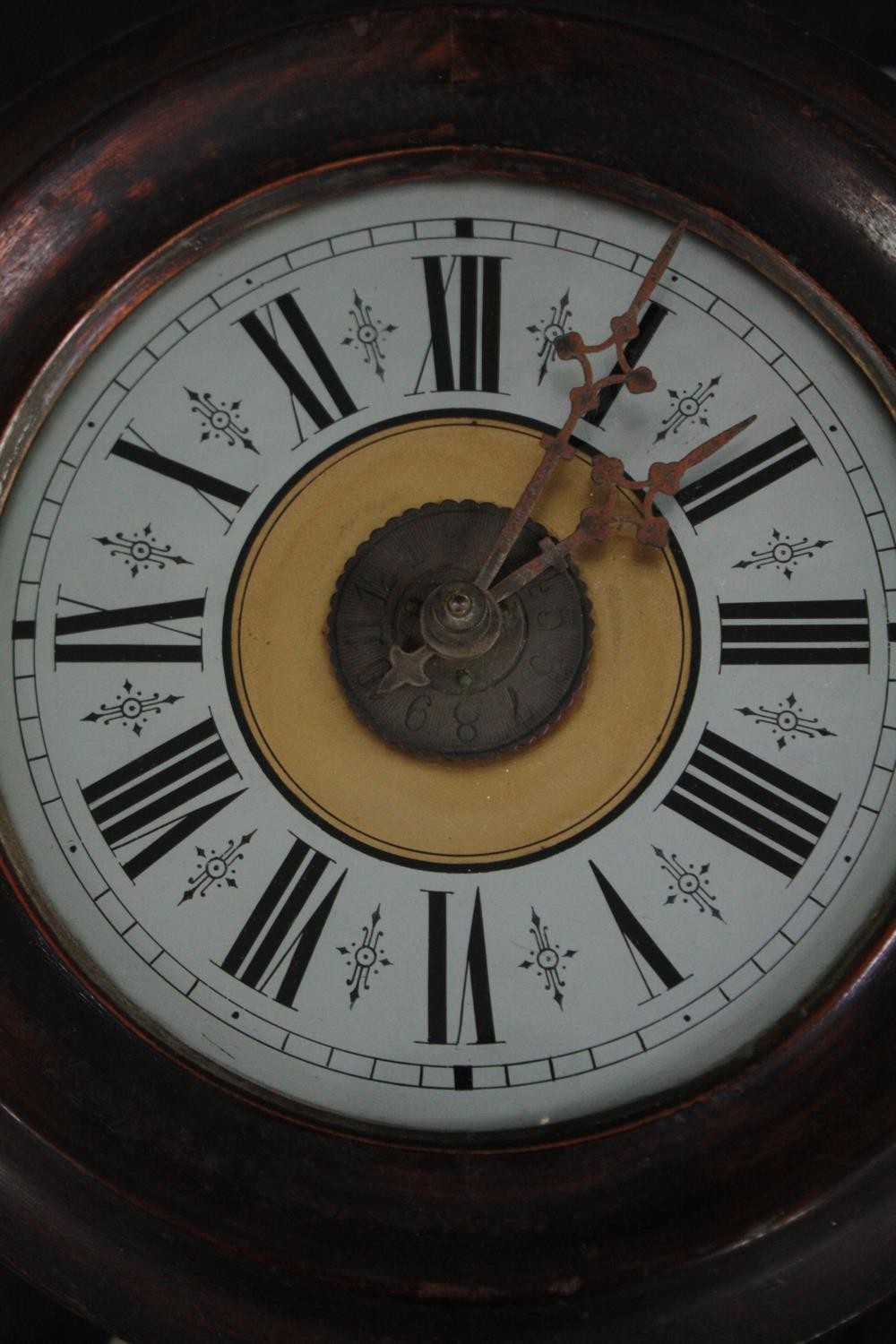 A 19th century Black Forest postman's alarm clock with black Roman numerals and fir cone weights. - Image 2 of 6