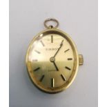 A Tissot 18ct yellow gold automatic ladies pendant watch with hanging loop. Oval face with gilt
