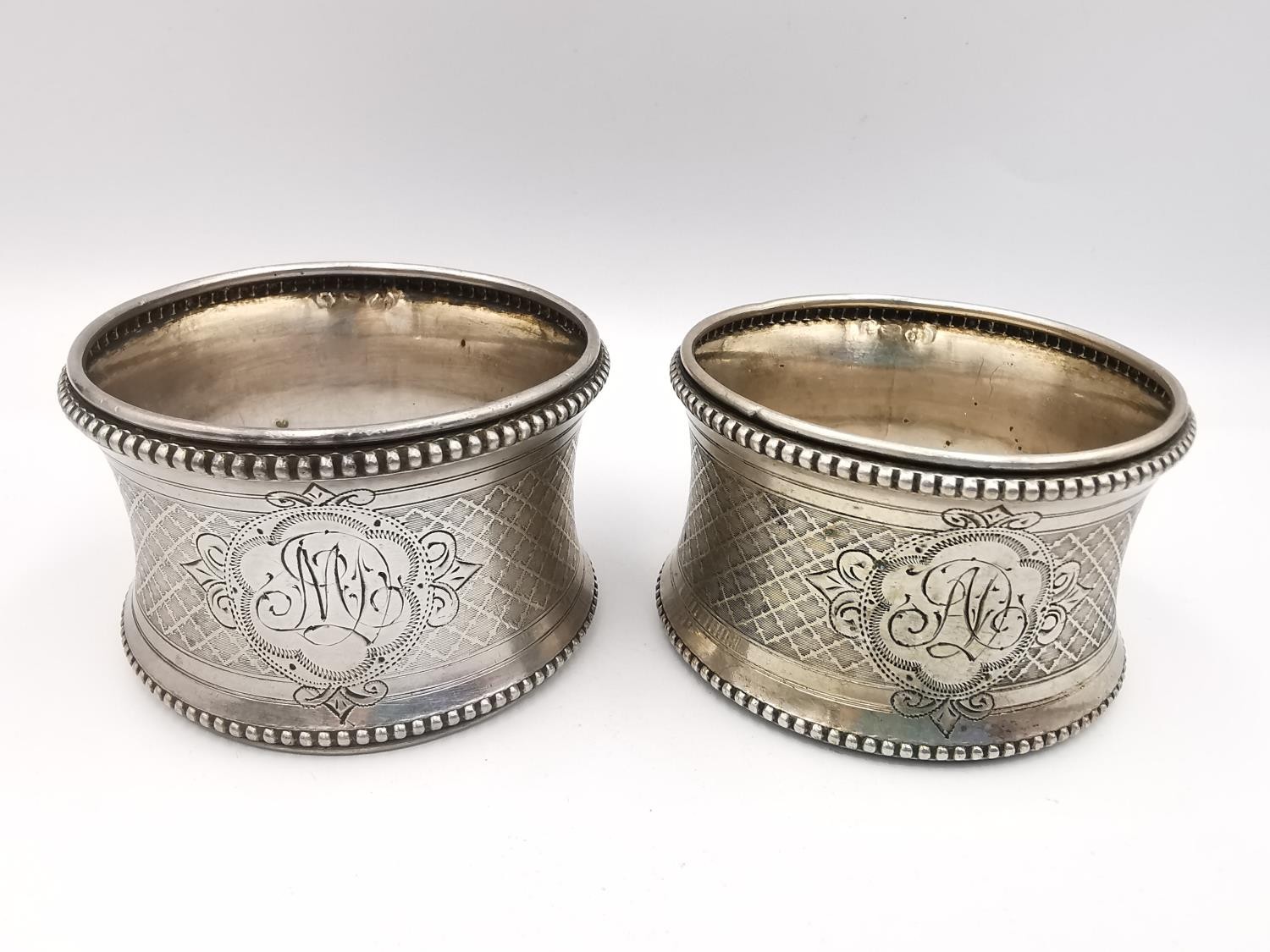 A collection of seven silver napkin rings, including an etched silver napkin ring by Gunther Theodor - Image 2 of 8