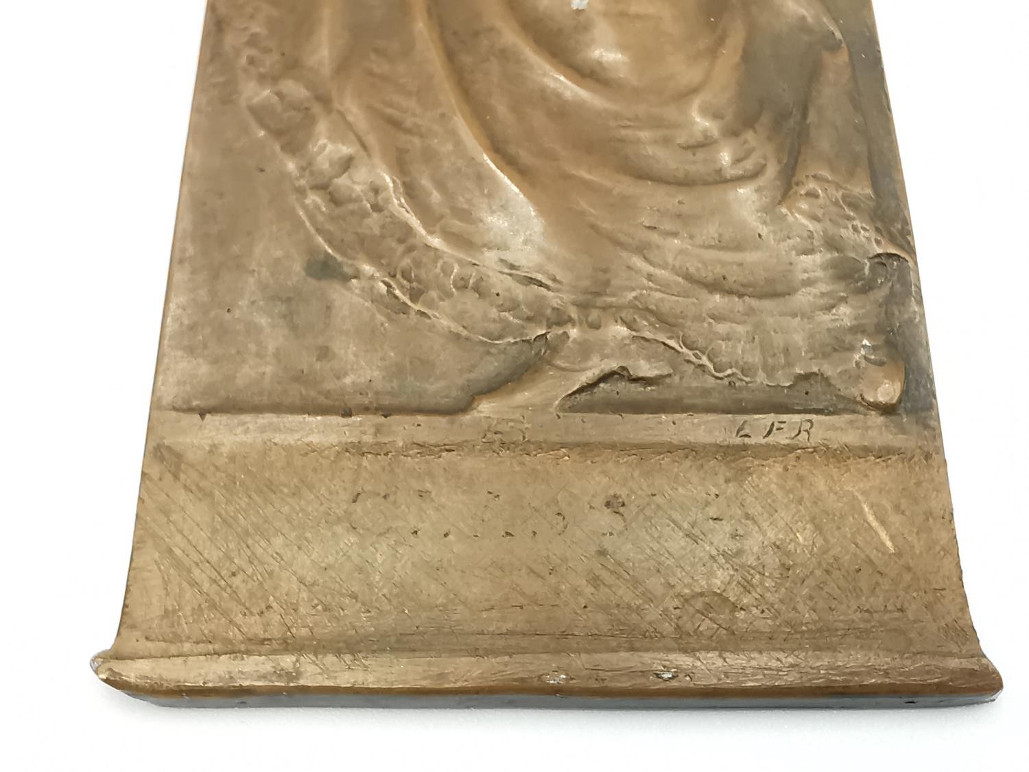 An Art Nouveau bronze relief plaque of a lady in flowing dress holding a magic lantern among blossom - Image 2 of 5