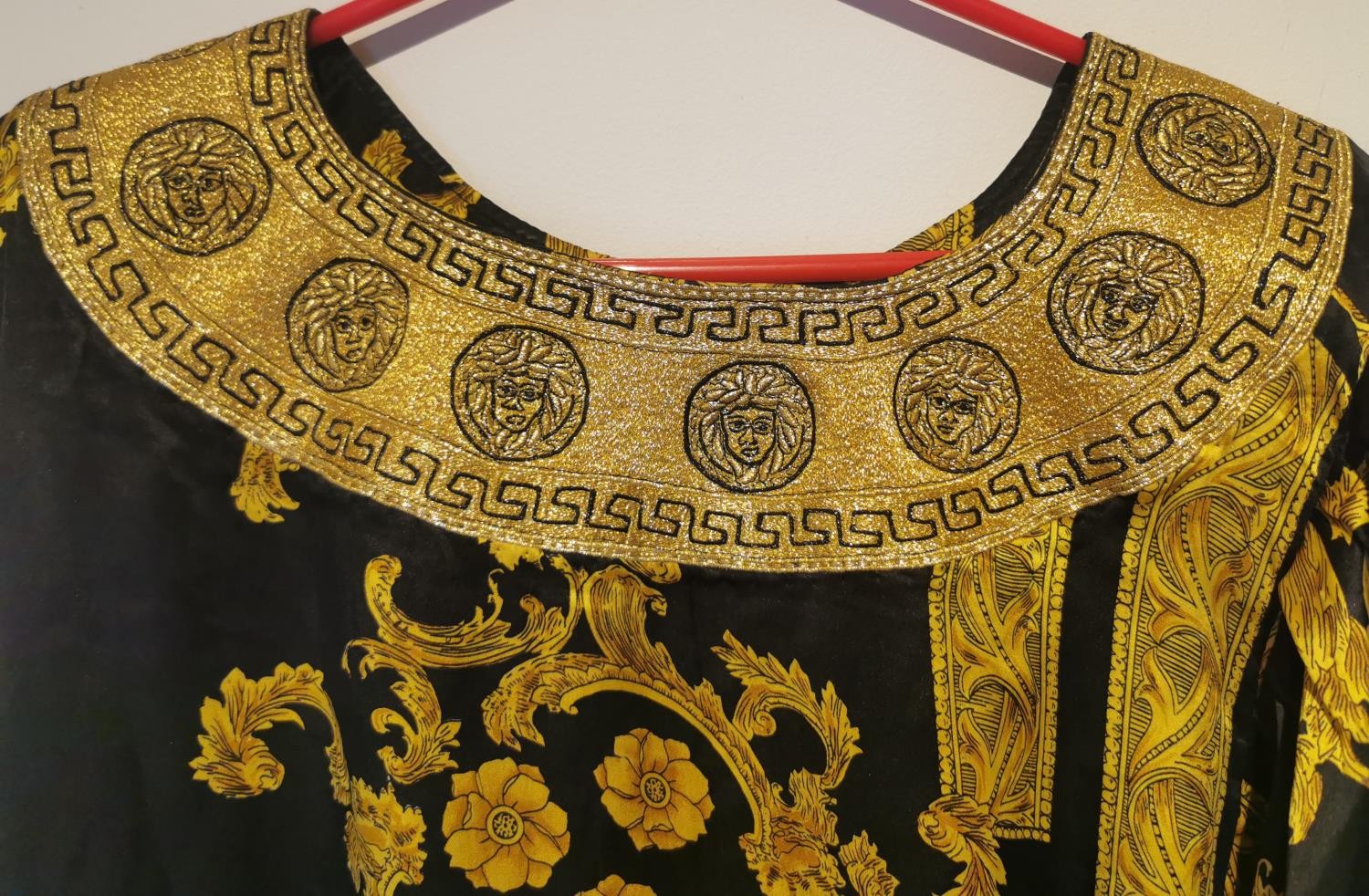 After Versace, a vintage black and gold silk Middle Eastern bespoke made robe with renaissance - Image 2 of 6